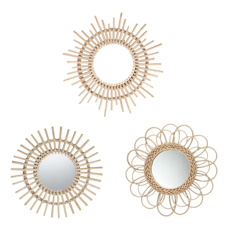 Three round mirrors with rattan frames in different styles: two sunburst designs and one looped petal design