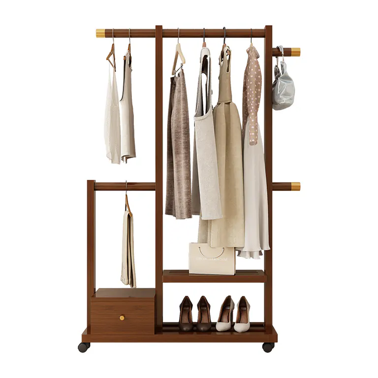 Freestanding wooden clothes rack in a dark finish with a hanging rail, side hooks, a small drawer, a shoe shelf and wheels, on a white background